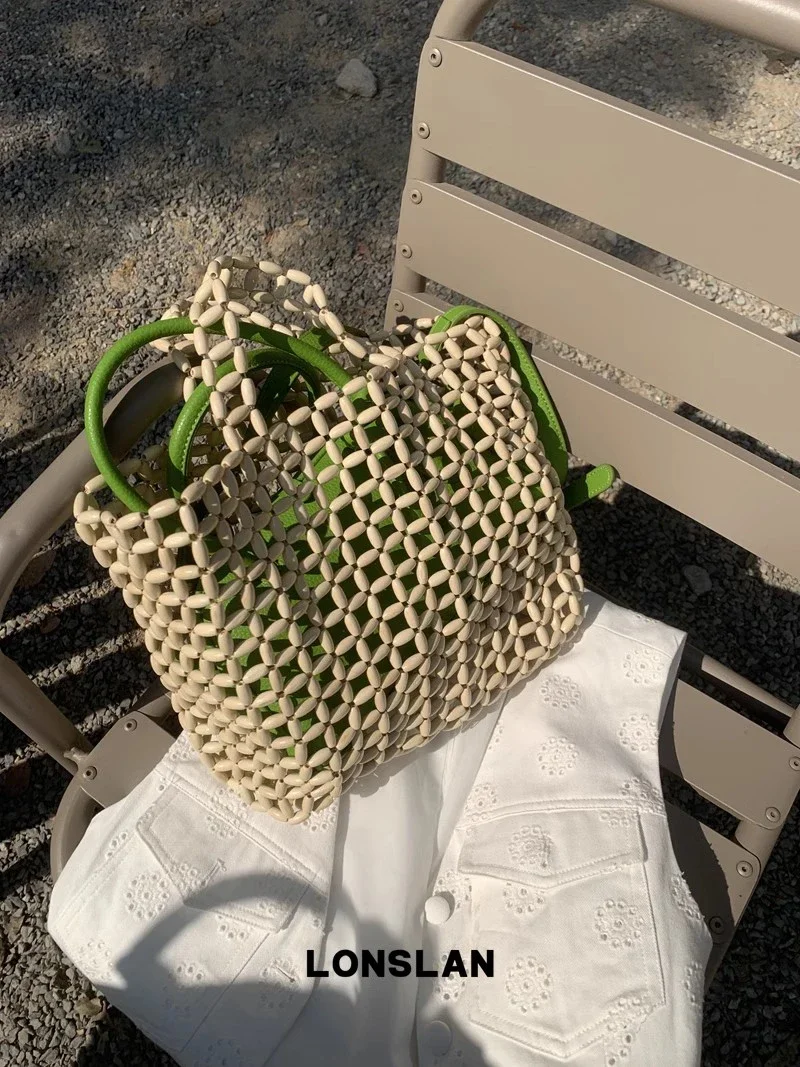Fashionable Hallow Out Casual Woven Purses and Handbags Niche Design Wooden Bead Women Handbags Big Black Designer Bags
Fashionable Hallow Out Casual Woven Purses and Handbags Niche Design Wooden Bead Women Handbags Big Black Designer Bags