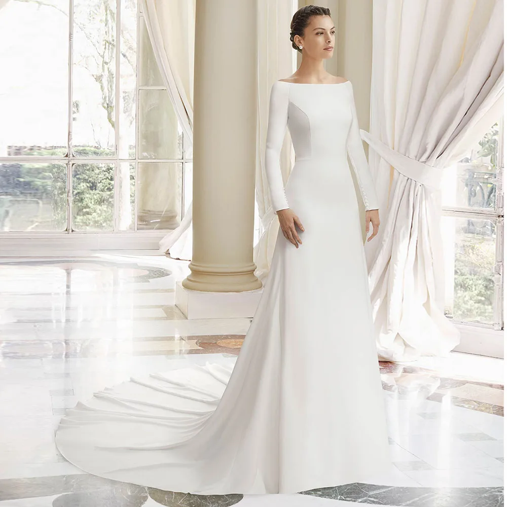 Elegant Ivory A Line Wedding Gowns Long Sleeves Bridal Dress Back Buttons Boat Neck Floor Length Wedding Dresses for Women 2025
Elegant Ivory A Line Wedding Gowns Long Sleeves Bridal Dress Back Buttons Boat Neck Floor Length Wedding Dresses for Women 2025