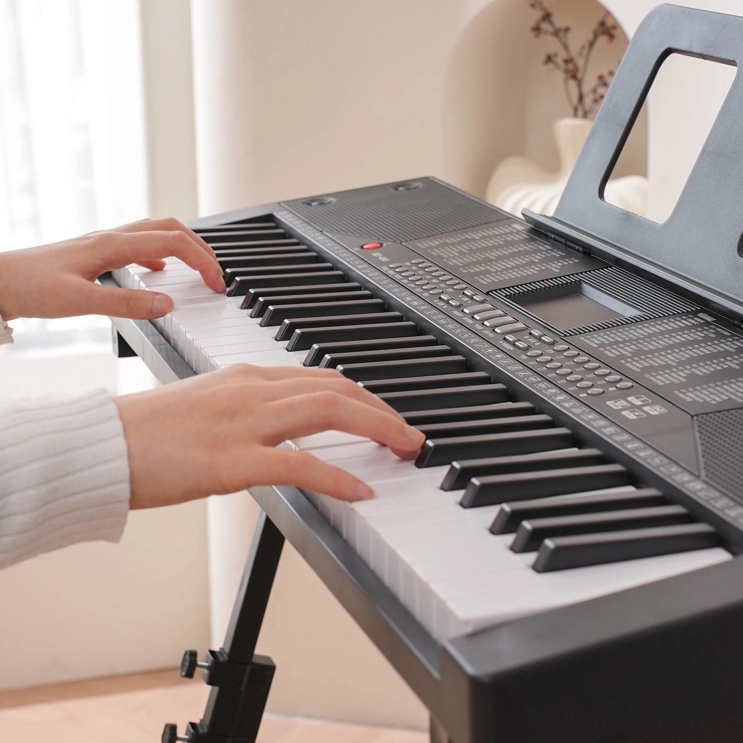 Electronic keyboard instrument 61-key portable electric piano with 200 rhythms and 200 tones
Electronic keyboard instrument 61-key portable electric piano with 200 rhythms and 200 tones