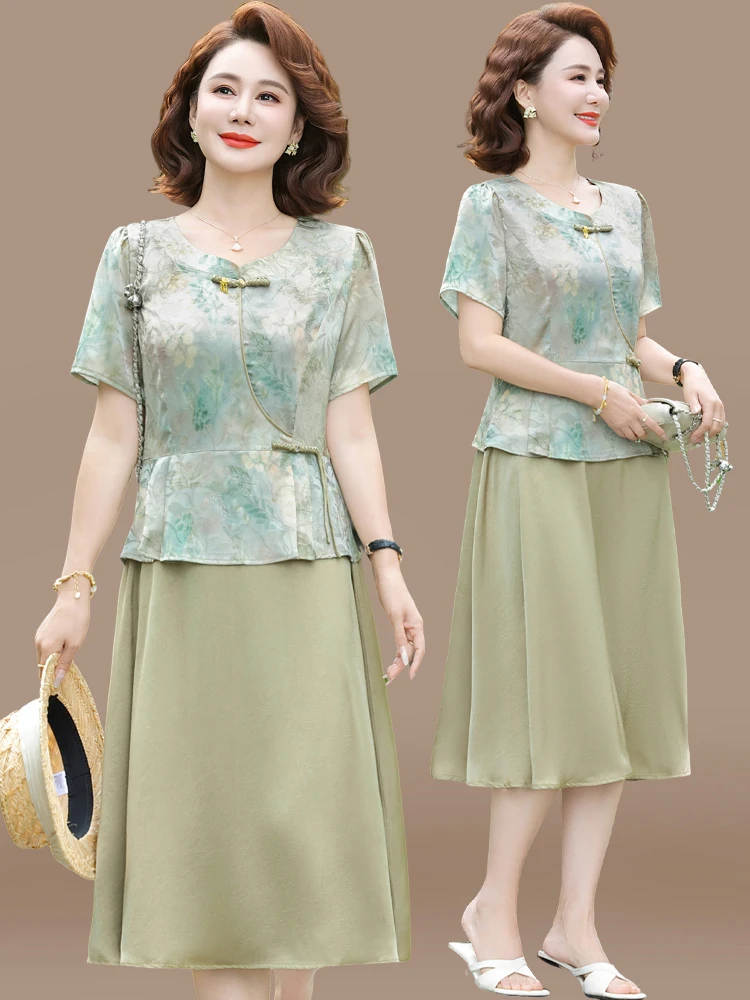 Новое китайское летнее платье из ледяного шелка с коротким рукавом для женщин, модное, для среднего возраста, длинное, с цветочным принтом
Новое китайское летнее платье из ледяного шелка с коротким рукавом для женщин, модное, для среднего возраста, длинное, с цветочным принтом