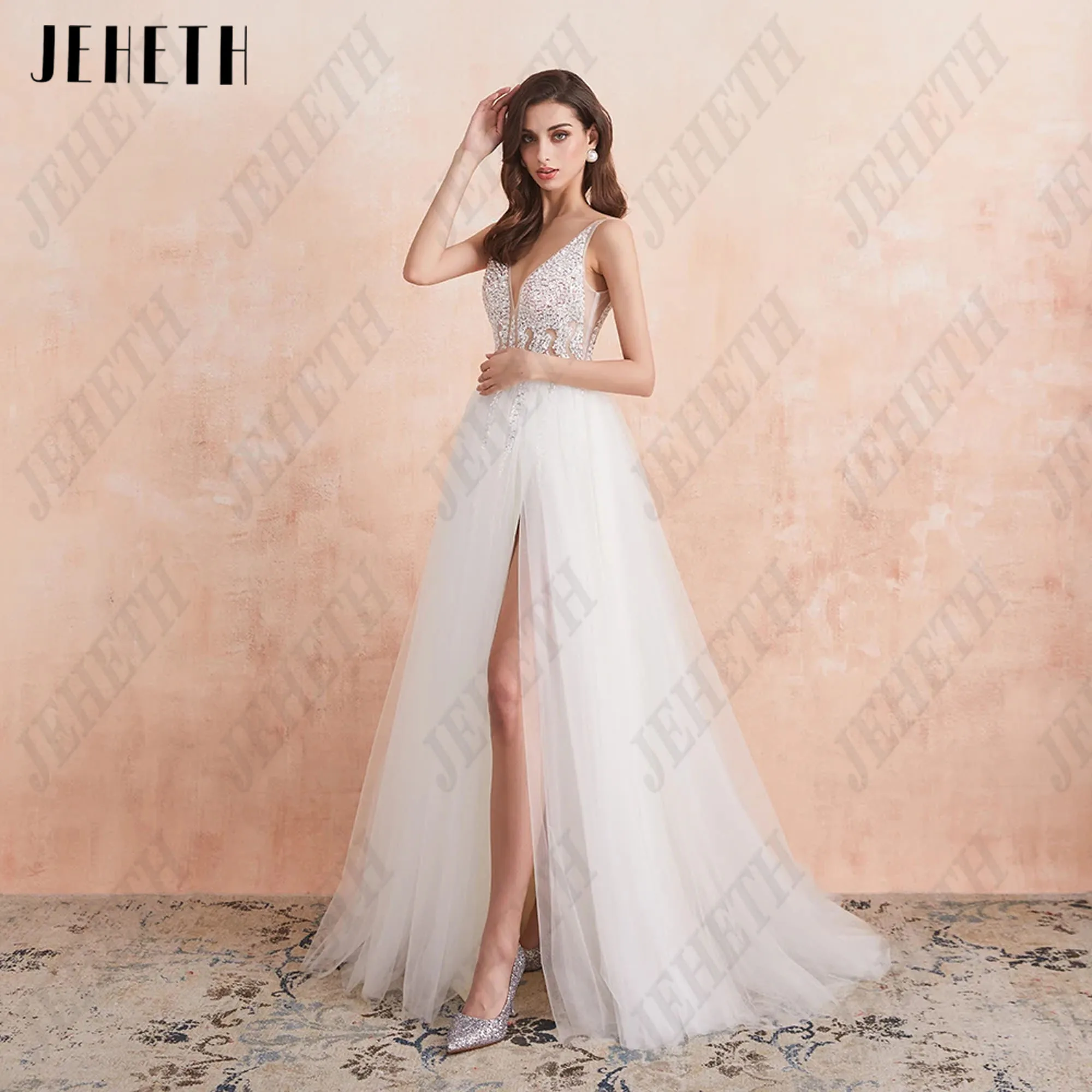 JEHETH V-Neck Wedding Dress White Sexy High Splits Beaded Beading Pearls Crystal A-Line Backless Bridal Gown Vestidos Customized
JEHETH V-Neck Wedding Dress White Sexy High Splits Beaded Beading Pearls Crystal A-Line Backless Bridal Gown Vestidos Customized