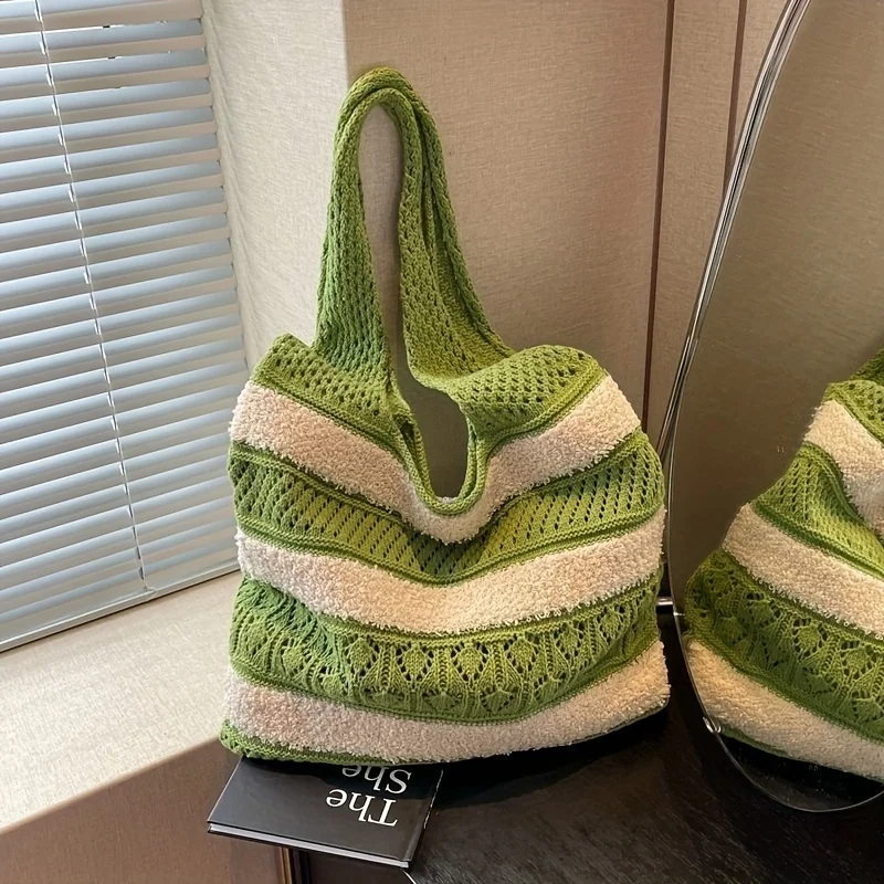A New Summer Beach Bag for Women Featuring A Woven Design and A Striped Hollow Handbag That Can Be Carried On The Shoulder
A New Summer Beach Bag for Women Featuring A Woven Design and A Striped Hollow Handbag That Can Be Carried On The Shoulder