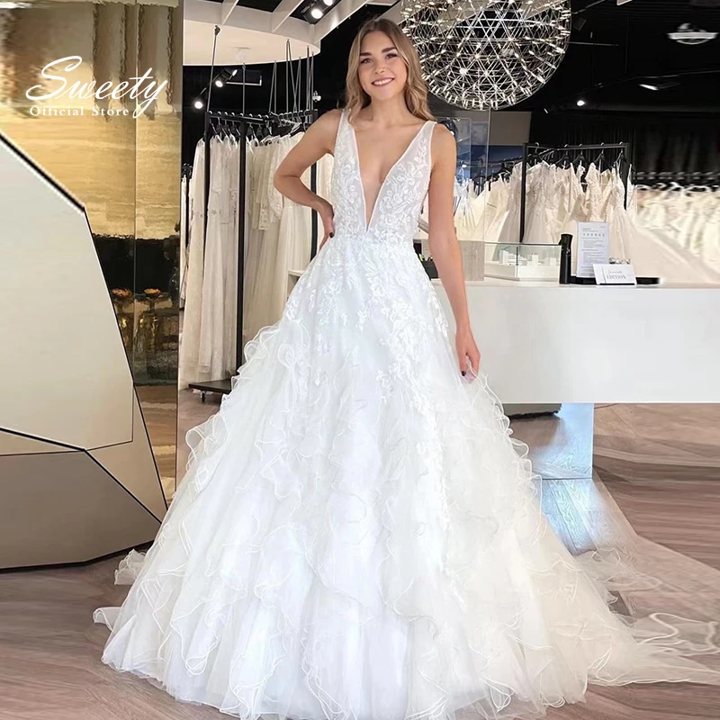 Sexy Wedding Dress Organza With Embroidery Lace A-line Ball Gown Ball Gown Sleeveless Bride Dress Back Backless Robe De Mariee
Sexy Wedding Dress Organza With Embroidery Lace A-line Ball Gown Ball Gown Sleeveless Bride Dress Back Backless Robe De Mariee