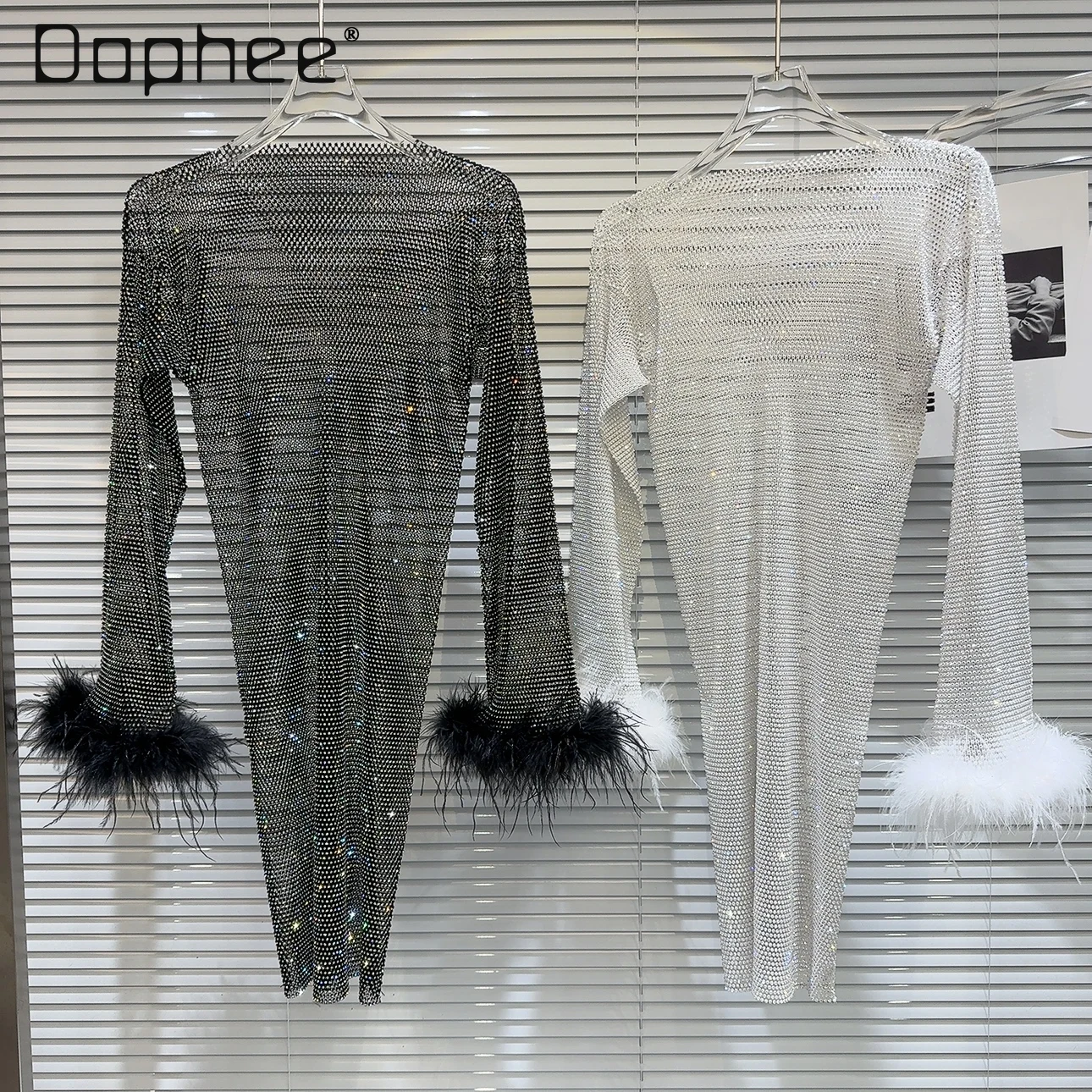 Ostrich Feather Stitching Long Sleeve Mesh Hollow-out Mid-Length Round Neck Dress Spring Autumn Sexy Rhinestone Women's Clothing
Ostrich Feather Stitching Long Sleeve Mesh Hollow-out Mid-Length Round Neck Dress Spring Autumn Sexy Rhinestone Women's Clothing