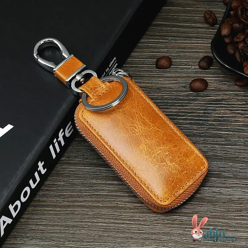 Новая модная винтажная ключница из натуральной кожи с молнией, чехол для ключей от автомобиля/автобуса, простой и элегантный дизайн
Новая модная винтажная ключница из натуральной кожи с молнией, чехол для ключей от автомобиля/автобуса, простой и элегантный дизайн