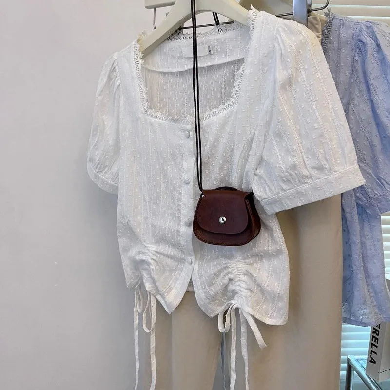 Femme Summer Korean Fashion Shirring Solid Color Square Collar Cotton Short Sleeve Women Clothing All-match Button Puff Sleeve T
Femme Summer Korean Fashion Shirring Solid Color Square Collar Cotton Short Sleeve Women Clothing All-match Button Puff Sleeve T