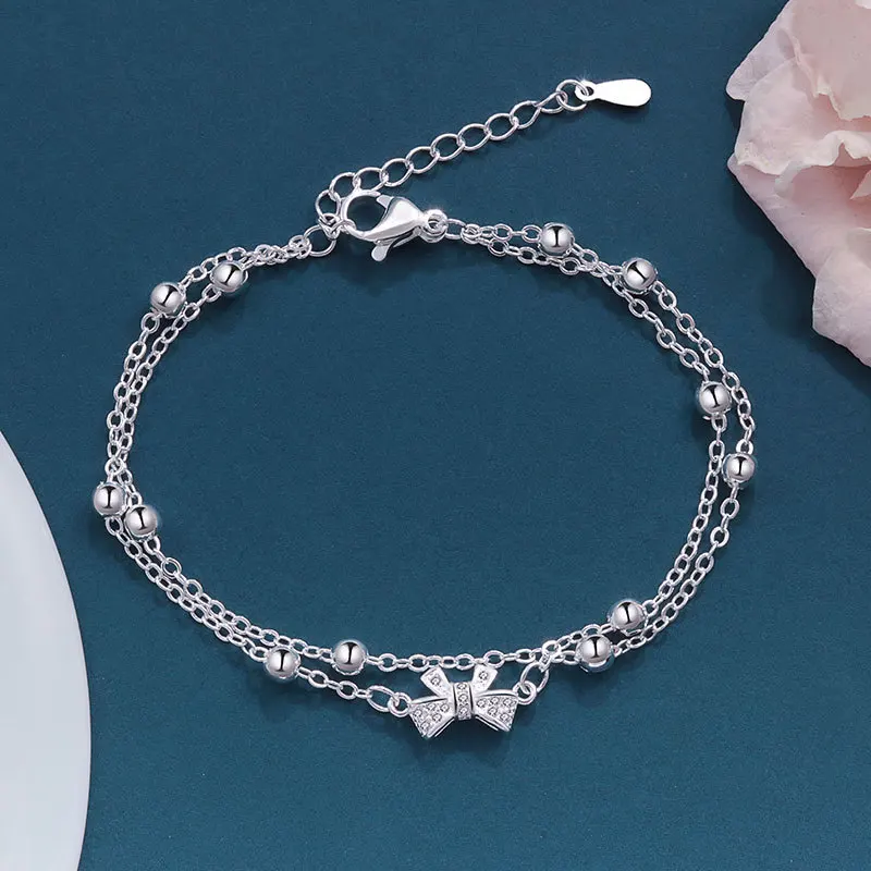 VENTFILLE 925 Sterling Silver Double-Layered Bow Chain Bracelet For Girl Gift Cute Romantic Jewelry Dropshipping Wholesale
VENTFILLE 925 Sterling Silver Double-Layered Bow Chain Bracelet For Girl Gift Cute Romantic Jewelry Dropshipping Wholesale
