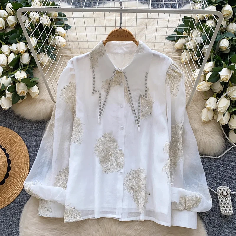 Легкая роскошная рубашка во французском стиле с острым воротником и рукавами-фонариками для женщин, модная рубашка с блестками и вышивкой 
Легкая роскошная рубашка во французском стиле с острым воротником и рукавами-фонариками для женщин, модная рубашка с блестками и вышивкой