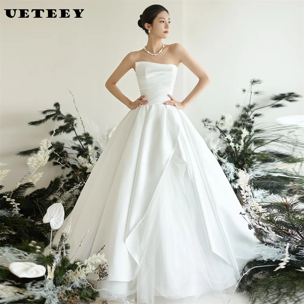 UETEEY Customized Korea Sleeveless Simple Strapless Crepe Pleat A Line Wedding Dress Tulle Lace Up Back Floor Length Bridal Gown
UETEEY Customized Korea Sleeveless Simple Strapless Crepe Pleat A Line Wedding Dress Tulle Lace Up Back Floor Length Bridal Gown