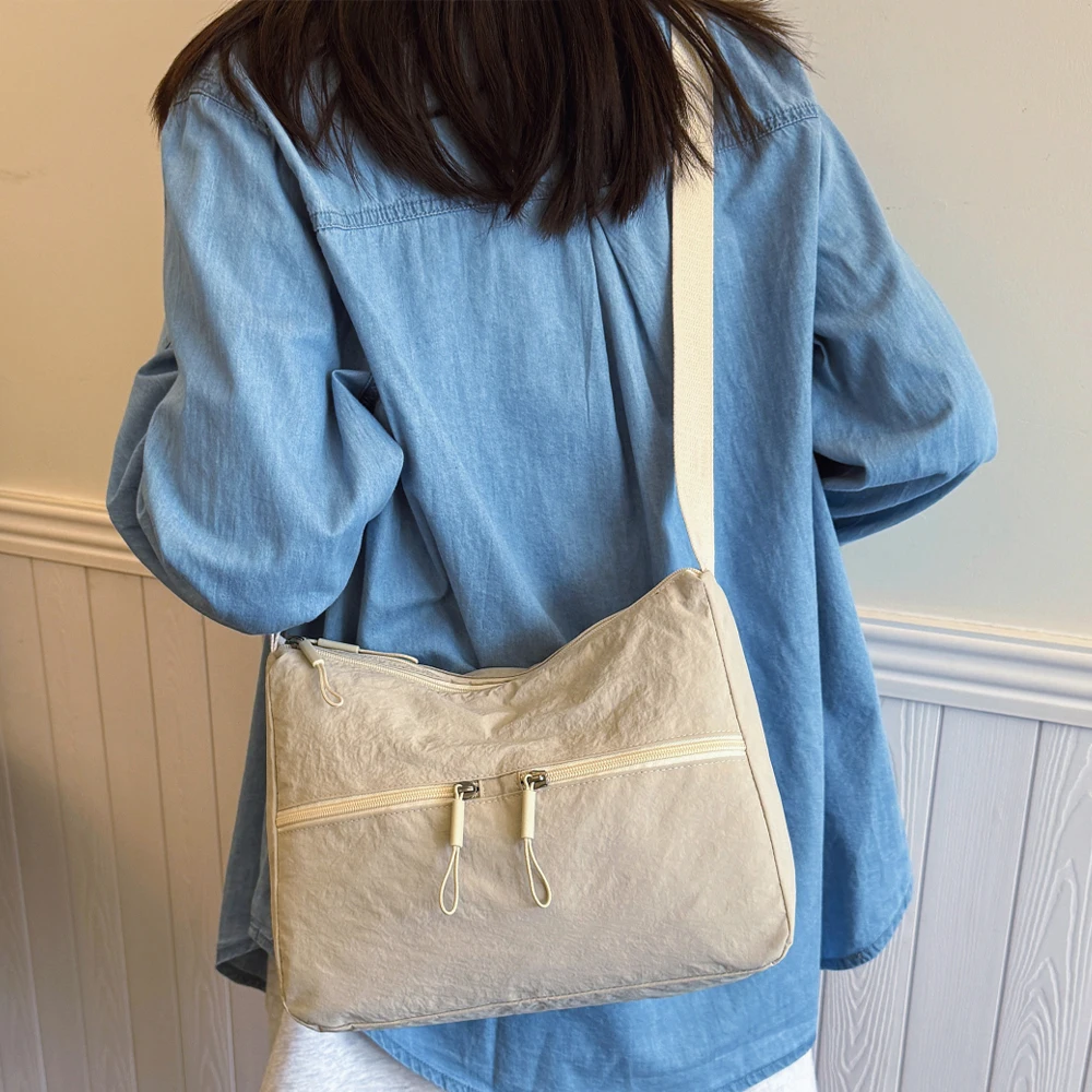 Outdoor Travel Crossbody Bag 2025 New Lightweight Large Capacity Nylon Canvas Backpack Armpit Bag Tote Bag
Outdoor Travel Crossbody Bag 2025 New Lightweight Large Capacity Nylon Canvas Backpack Armpit Bag Tote Bag