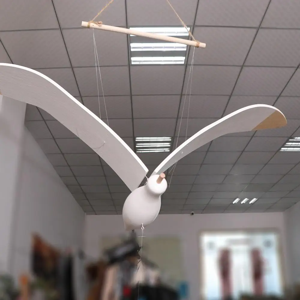 Wooden Flying Seagull Hanging Ornament Creative Elegant Flying Flapping Seagull Crafts Vintage Mediterranean Air Charm
Wooden Flying Seagull Hanging Ornament Creative Elegant Flying Flapping Seagull Crafts Vintage Mediterranean Air Charm