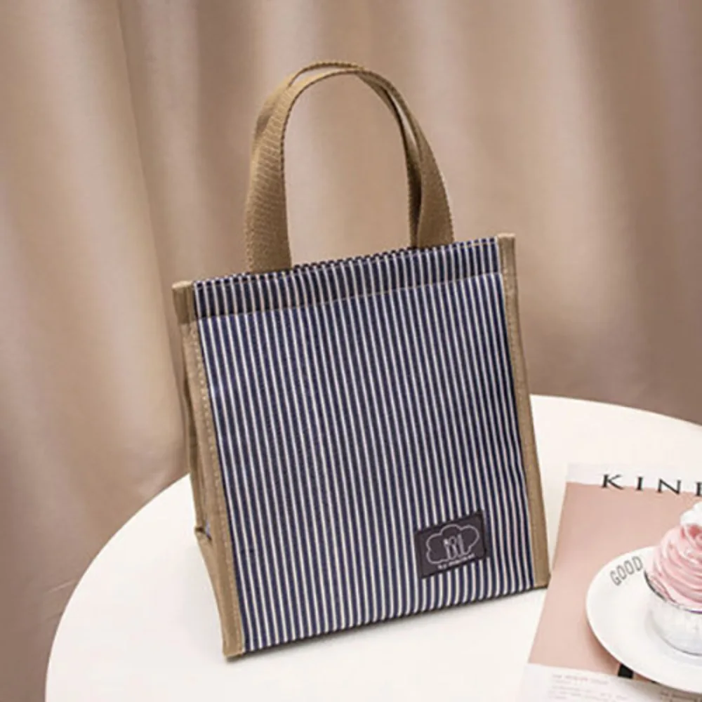 Waterproof Insulated Thermal Lunch Bag Large Capacity Stripe Hand-held Picnic Food Pouch Thickened Oxford Cloth Storage Handbag
Waterproof Insulated Thermal Lunch Bag Large Capacity Stripe Hand-held Picnic Food Pouch Thickened Oxford Cloth Storage Handbag