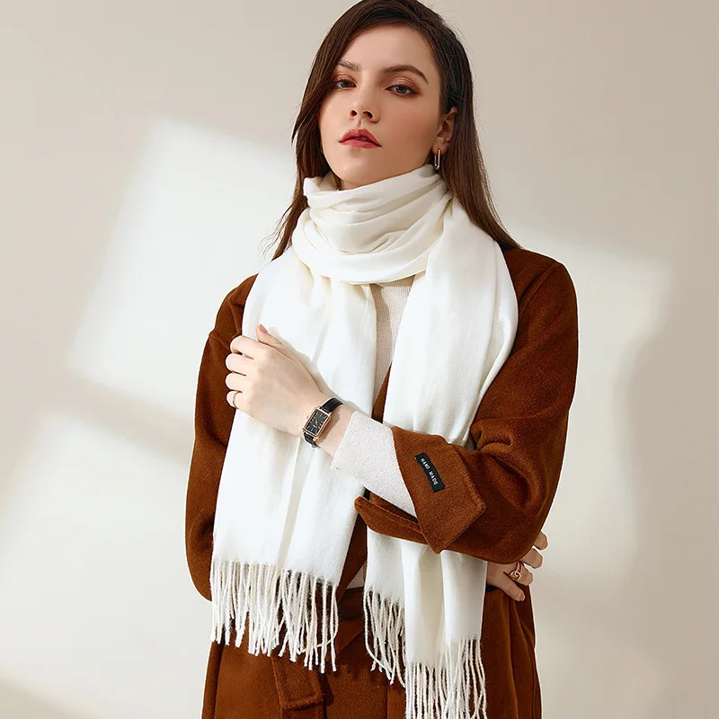 New autumn and winter women's solid color cashmere scarf mid-length warm outside with sweet tassel scarf
New autumn and winter women's solid color cashmere scarf mid-length warm outside with sweet tassel scarf