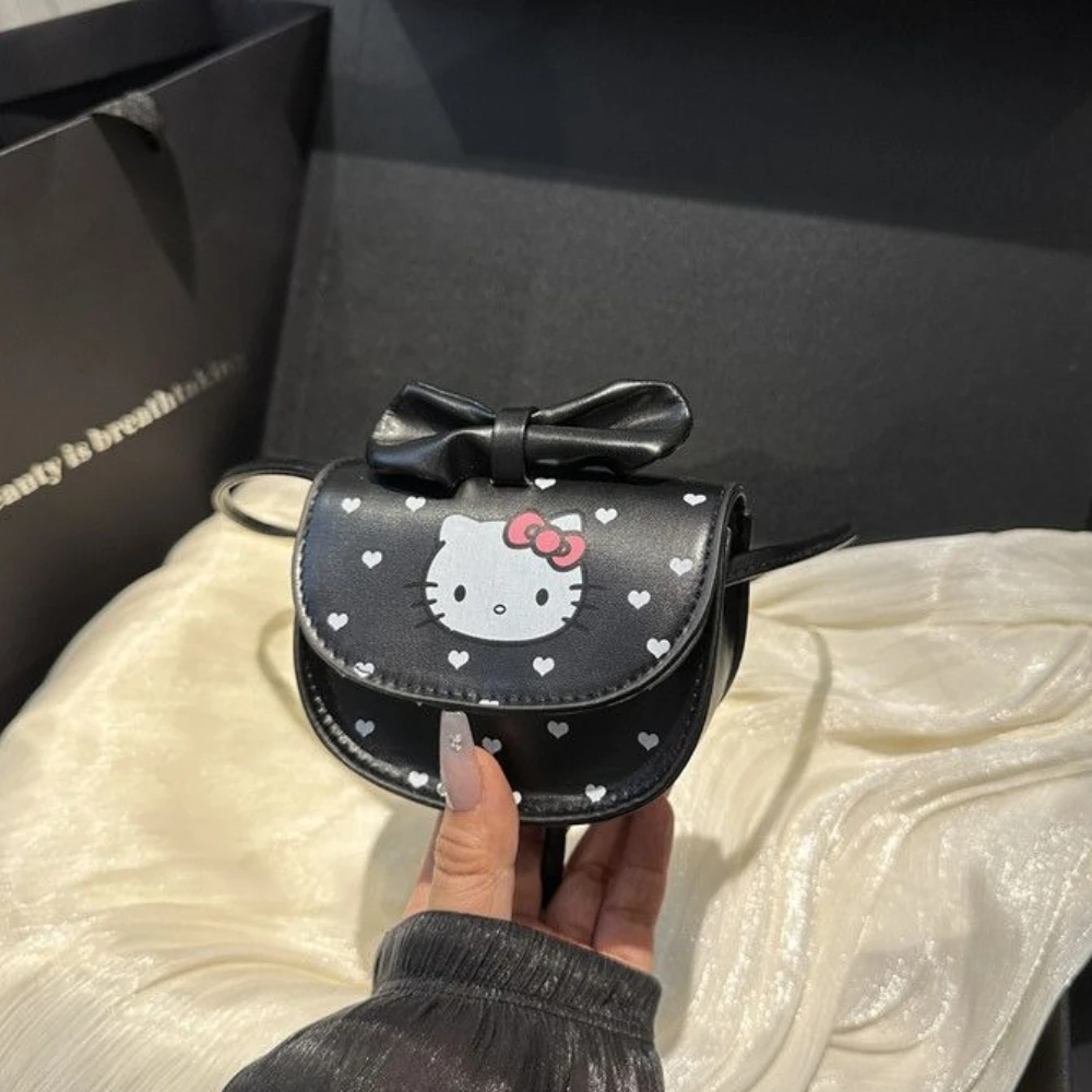 New mini Hello Kitty Women's shoulder bag Fashion Cute cat print crossbody bag exquisite cartoon Sanrio shoulder crossbody bag
New mini Hello Kitty Women's shoulder bag Fashion Cute cat print crossbody bag exquisite cartoon Sanrio shoulder crossbody bag