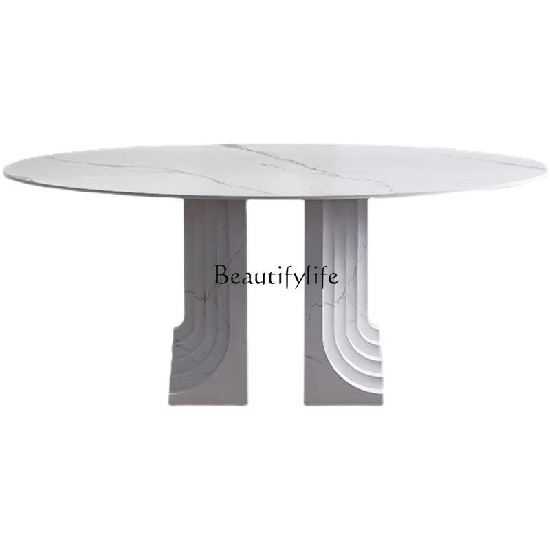 Oval rock slab dining table light luxury high-end dining table integrated household cream style
Oval rock slab dining table light luxury high-end dining table integrated household cream style