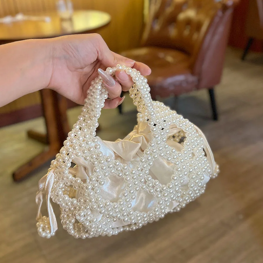 Handmade beaded woven bag retro celebrity temperament handbag hollow silk satin cheongsam bag
Handmade beaded woven bag retro celebrity temperament handbag hollow silk satin cheongsam bag