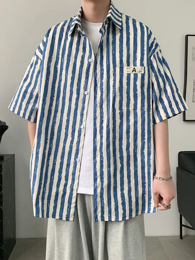 Мужская модная летняя рубашка в полоску с коротким рукавом, молодежная, трендовая, на пуговицах, тонкая, повседневная, свободного кроя
Мужская модная летняя рубашка в полоску с коротким рукавом, молодежная, трендовая, на пуговицах, тонкая, повседневная, свободного кроя