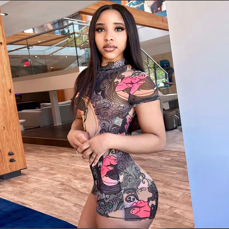 Stunning Print Backless Playsuits Women 2025 Summer Sexy Mesh O-neck Short Sleeve Ruched Peach Hips Slim Rompers Club Overalls
Stunning Print Backless Playsuits Women 2025 Summer Sexy Mesh O-neck Short Sleeve Ruched Peach Hips Slim Rompers Club Overalls