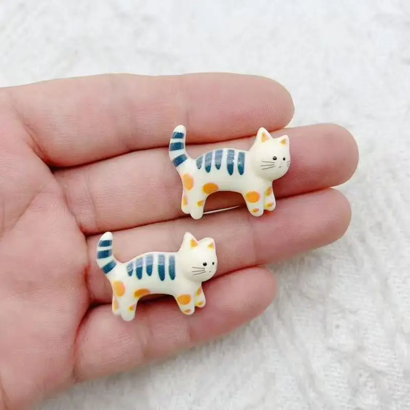 30*23mm resin cartoon cat animal jewelry pendant DIY cute kitten pet earrings necklace key chain accessories
30*23mm resin cartoon cat animal jewelry pendant DIY cute kitten pet earrings necklace key chain accessories