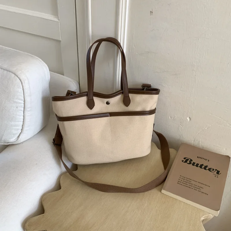 New Korean Crossbody Bags Fashion Canvas Tote Shoulder Bag Casual Boho Sling Purse Fashionable and Versatile Commuting Bag
New Korean Crossbody Bags Fashion Canvas Tote Shoulder Bag Casual Boho Sling Purse Fashionable and Versatile Commuting Bag