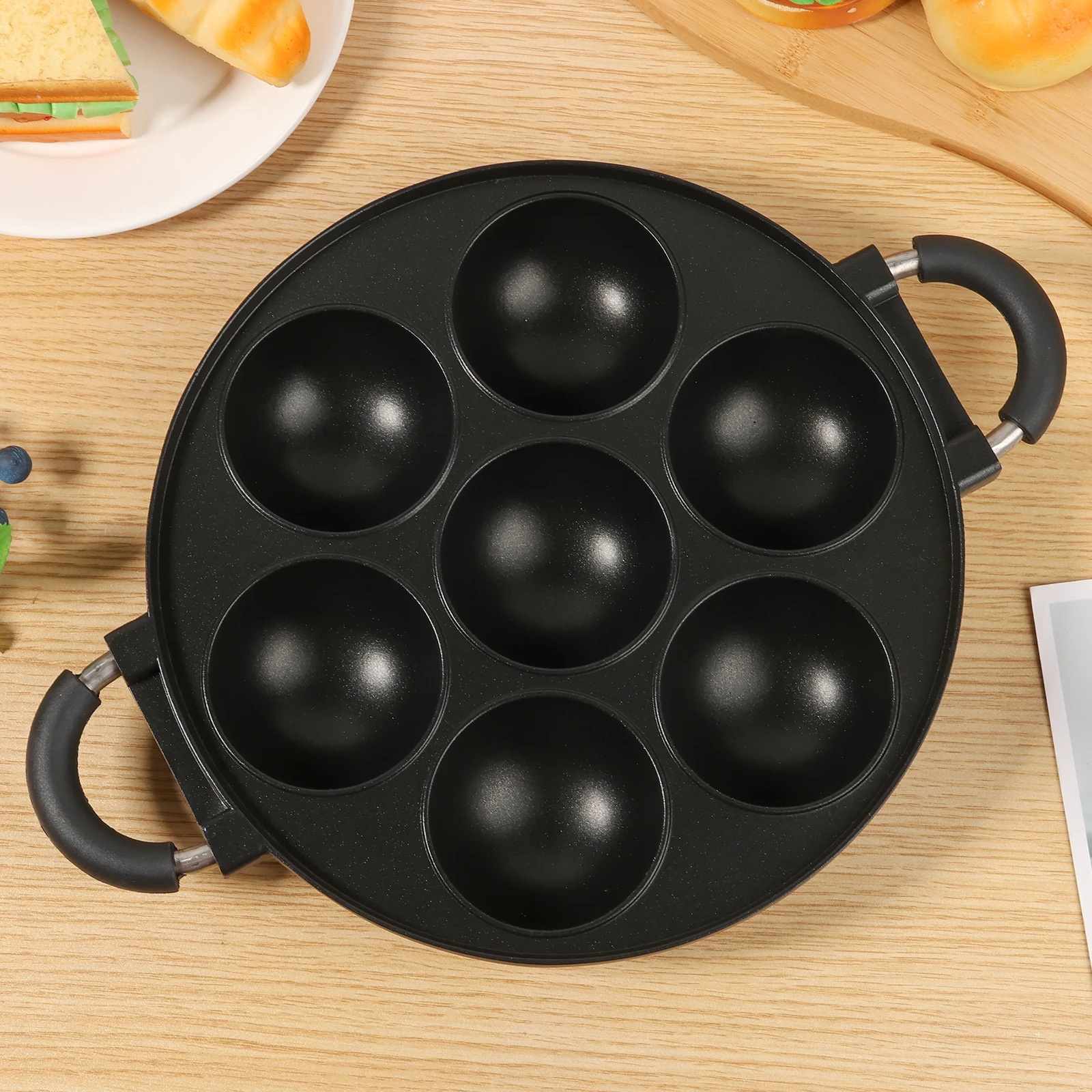 7-hole octopus meatball frying pan baking tray mold with Ergonomic Handle Aluminum Alloy Meat Ball Maker Pan for Home Kitchen
7-hole octopus meatball frying pan baking tray mold with Ergonomic Handle Aluminum Alloy Meat Ball Maker Pan for Home Kitchen