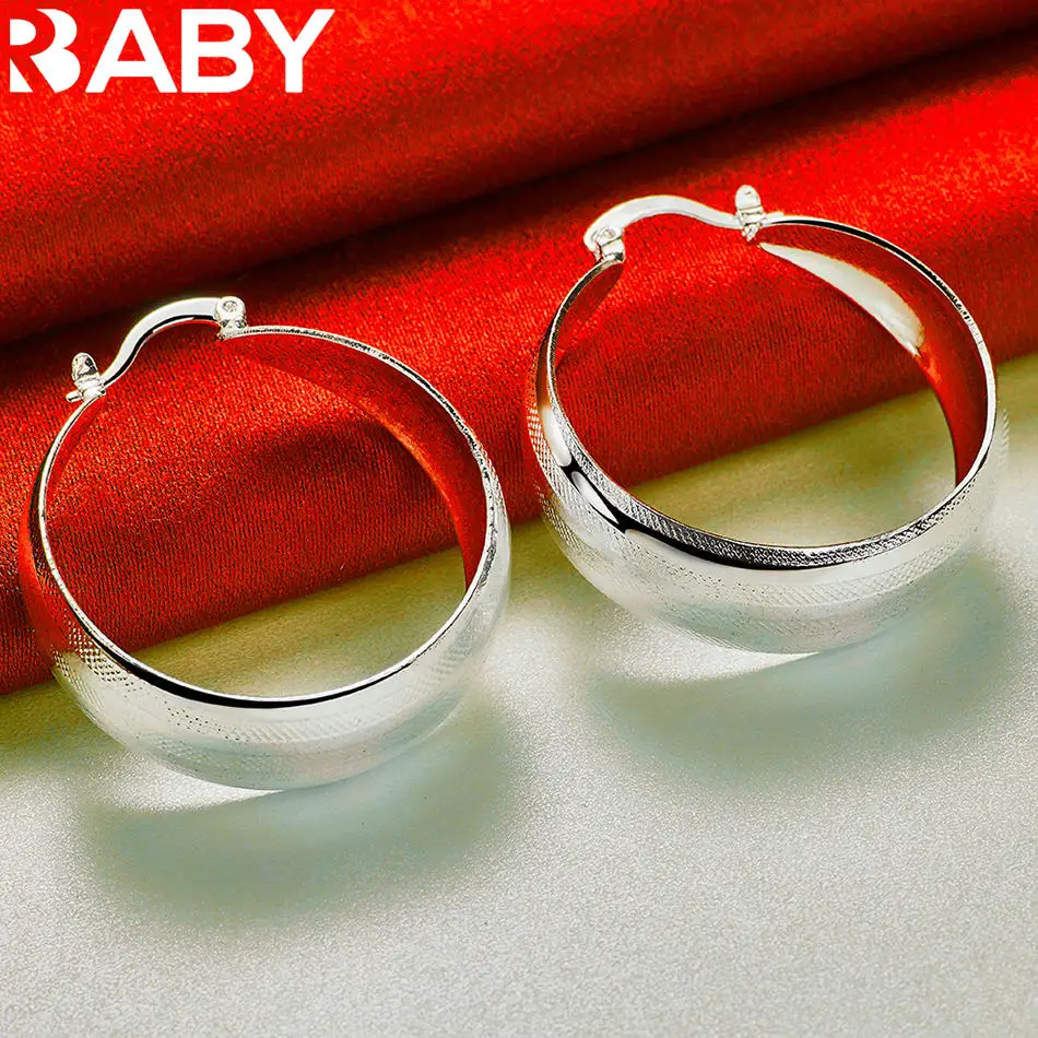 URBABY 925 Sterling Silver 25mm Frosted Smooth Hoop Earrings For Women Fashion Charm Jewelry Engagement Wedding Accessories
URBABY 925 Sterling Silver 25mm Frosted Smooth Hoop Earrings For Women Fashion Charm Jewelry Engagement Wedding Accessories
