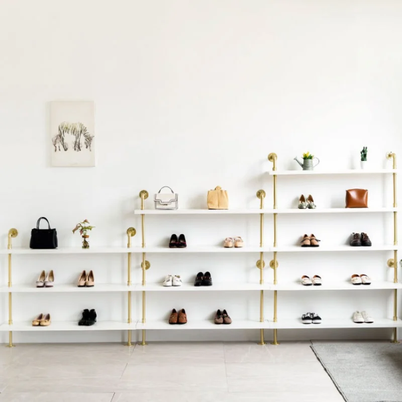 custom,Shopping Mall Showroom Design Modern Gold White Bag Shoes Display Rack Stand Wall Mounted Multilayer Shelf
custom,Shopping Mall Showroom Design Modern Gold White Bag Shoes Display Rack Stand Wall Mounted Multilayer Shelf