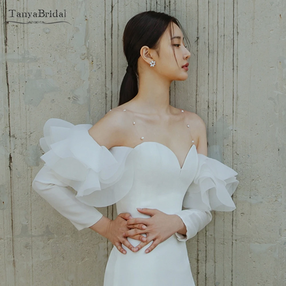 Мягкий атлас с пышной органзой, съемными свадебными рукавами, облегающие элегантные свадебные аксессуары Chic DG294
Мягкий атлас с пышной органзой, съемными свадебными рукавами, облегающие элегантные свадебные аксессуары Chic DG294