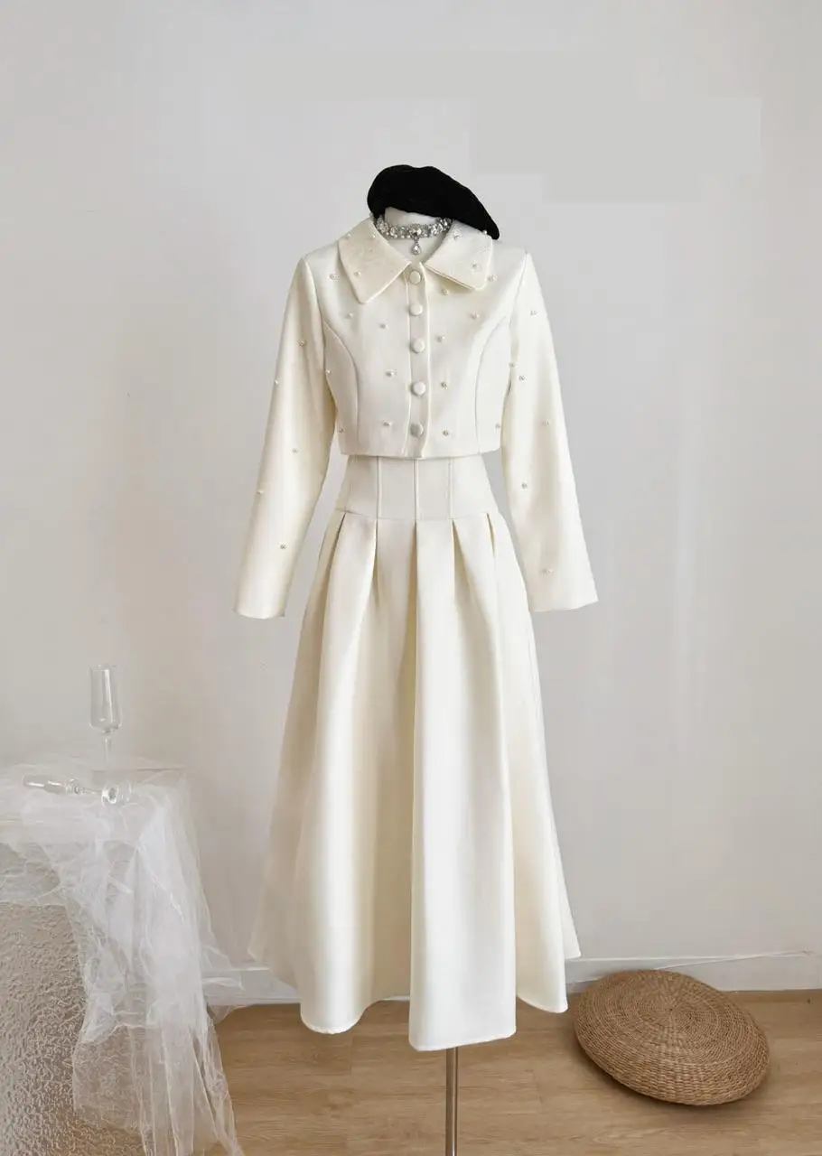 Женская элегантная юбка из двух предметов, комплект с жемчугом и длинным рукавом, короткая куртка с отложным воротником + плиссированная длинная юбка с высокой талией
Женская элегантная юбка из двух предметов, комплект с жемчугом и длинным рукавом, короткая куртка с отложным воротником + плиссированная длинная юбка с высокой талией