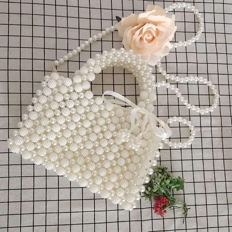 Сумка из искусственного жемчуга ручной работы, цвета экрю, модная универсальная женская сумка через плечо, сумка-кроссбоди Yangmeiqiu, сумка из экологичных материалов
Сумка из искусственного жемчуга ручной работы, цвета экрю, модная универсальная женская сумка через плечо, сумка-кроссбоди Yangmeiqiu, сумка из экологичных материалов