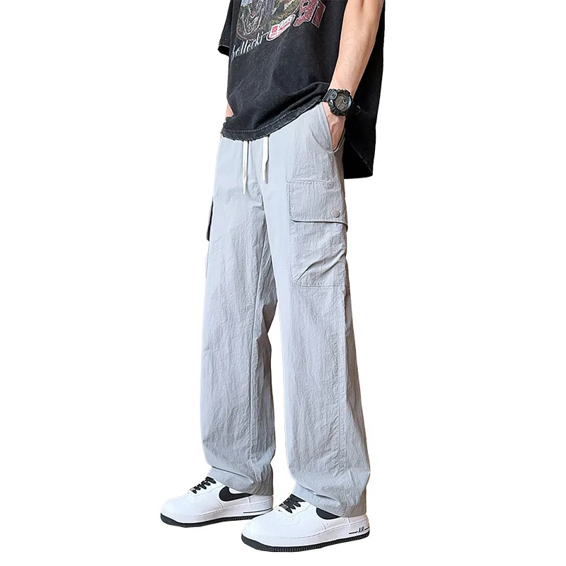 Spring and summer new nylon casual straight leg pants, lightweight material, loose drawstring, elastic waist men's pants
Spring and summer new nylon casual straight leg pants, lightweight material, loose drawstring, elastic waist men's pants