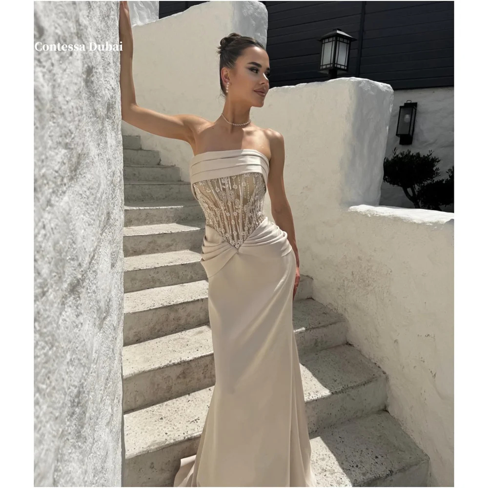 Contessa Dubai Khaki Sheath Strapless Prom Dresses Lace Embroidery Side pleatsفساتين سهرات Sweep Train 2025 robes de soirée
Contessa Dubai Khaki Sheath Strapless Prom Dresses Lace Embroidery Side pleatsفساتين سهرات Sweep Train 2025 robes de soirée