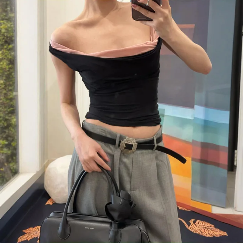 Color Blocking Small Swing Collar Waist Cinching Fake Two-Piece Top Summer New Suspender
Color Blocking Small Swing Collar Waist Cinching Fake Two-Piece Top Summer New Suspender