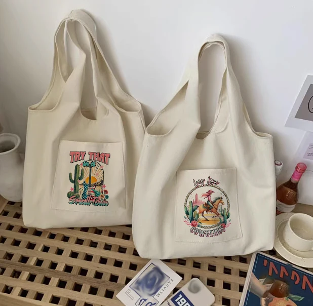 Vest bag, canvas vacation bag, western pink denim printed women's handbag storage bag, kitchen miscellaneous storage bag
Vest bag, canvas vacation bag, western pink denim printed women's handbag storage bag, kitchen miscellaneous storage bag