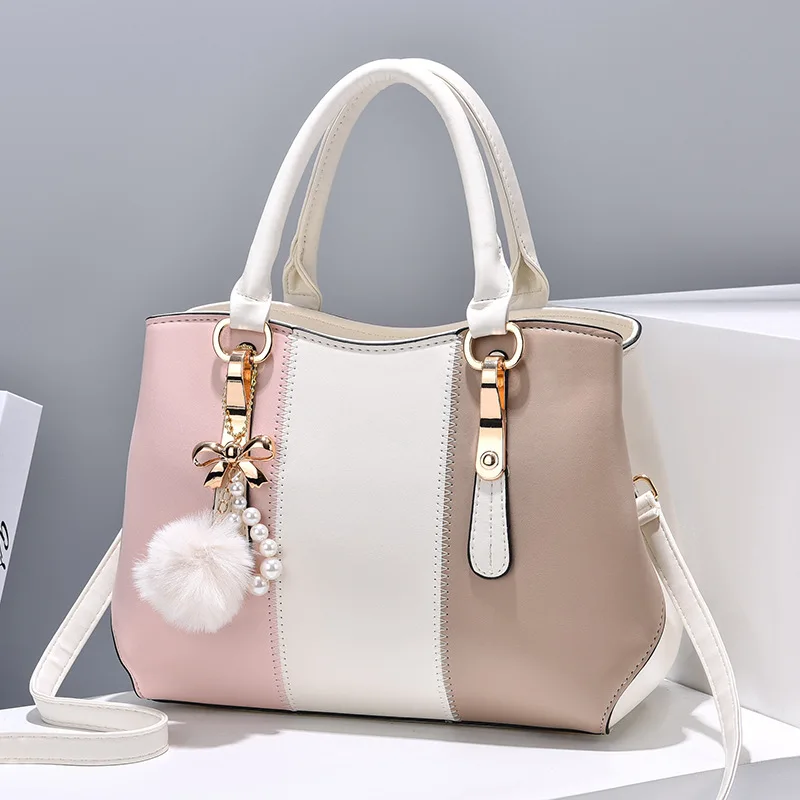 Stylish and atmospheric women's handbag large-capacity splicing contrasting color shoulder messenger bag 
Stylish and atmospheric women's handbag large-capacity splicing contrasting color shoulder messenger bag