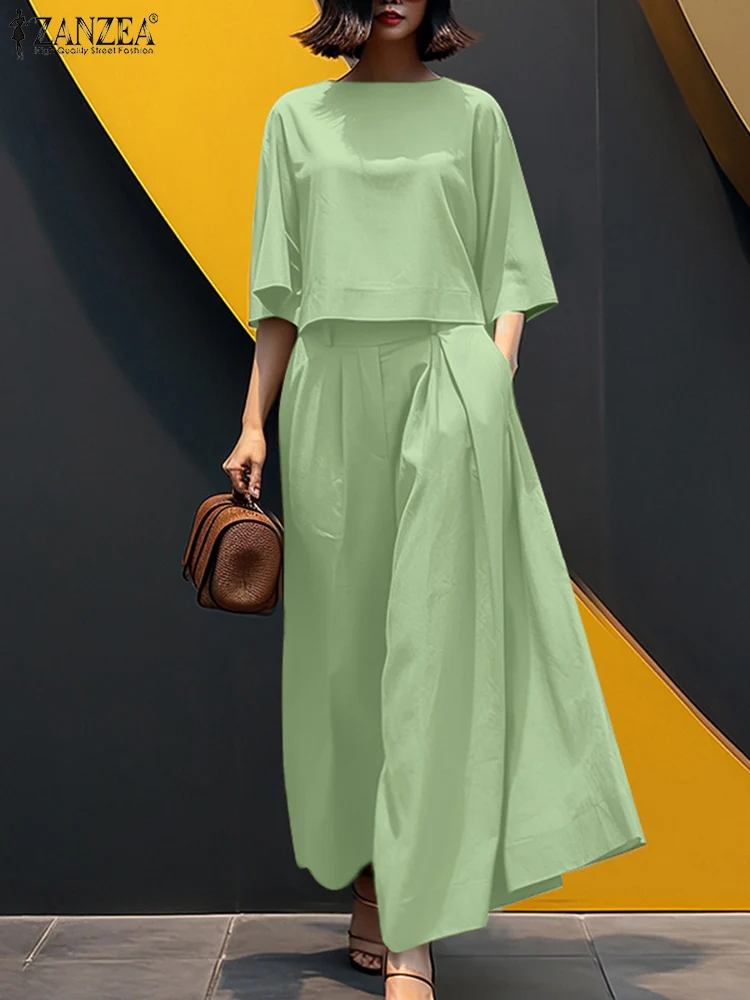 ZANZEA Women 2025 Summer Loose Matching Sets Elegant 3/4 Sleeve Blouse Wide Leg Trousers Suit Elegant OL Work Pant Sets Oversize
ZANZEA Women 2025 Summer Loose Matching Sets Elegant 3/4 Sleeve Blouse Wide Leg Trousers Suit Elegant OL Work Pant Sets Oversize