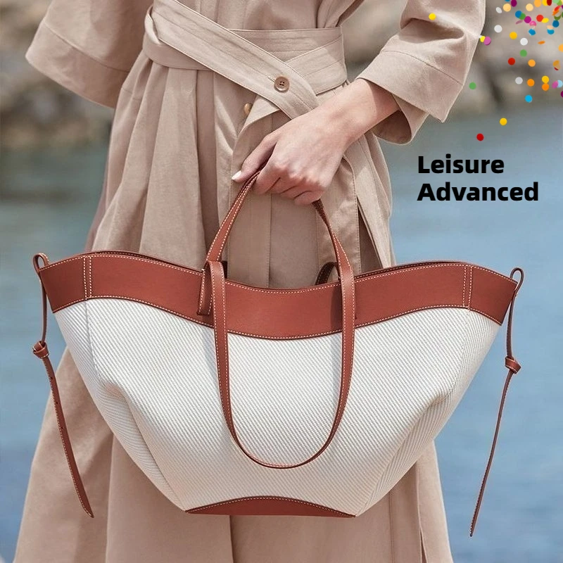 French style niche fashion casual high-end splicing tote bag, single shoulder large capacity tote bag, trendy commuting bag
French style niche fashion casual high-end splicing tote bag, single shoulder large capacity tote bag, trendy commuting bag