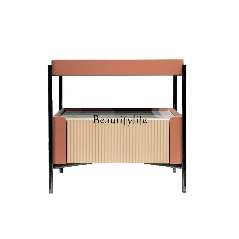 Light luxury modern rock slab bedside table designer high-end paint creative storage locker
Light luxury modern rock slab bedside table designer high-end paint creative storage locker