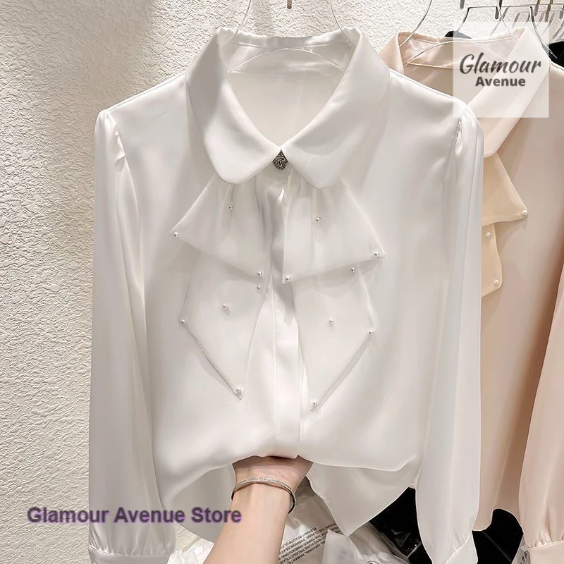 French temperament lapels ruffled beaded stitching long-sleeved shirts women's spring and autumn new fashion chiffon tops.
French temperament lapels ruffled beaded stitching long-sleeved shirts women's spring and autumn new fashion chiffon tops.