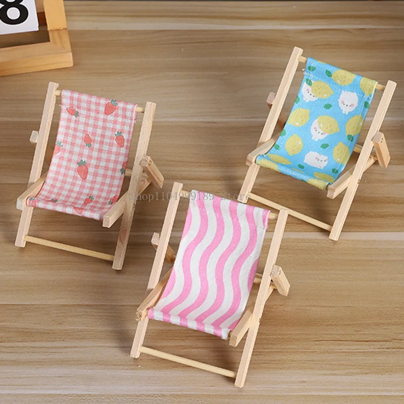 Mini Wooden Beach Chair Phone Stand Office Desktop Tablet Holder Photography Prop Comfortable Lounger Armrests Design
Mini Wooden Beach Chair Phone Stand Office Desktop Tablet Holder Photography Prop Comfortable Lounger Armrests Design