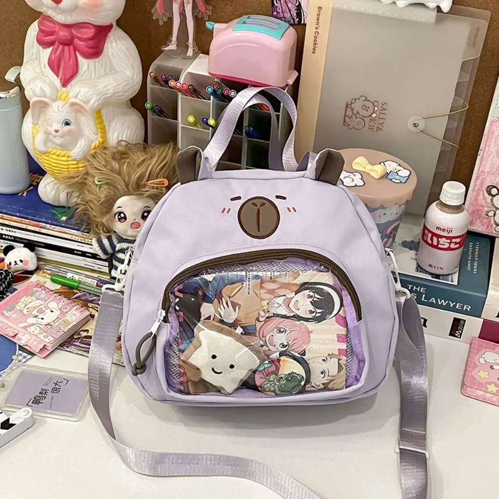 Сумка на плечо с капибарой в японском стиле, Harajuku, ПВХ, прозрачный значок Itabag, дисплей, большая вместительная холщовая сумка для покупок
Сумка на плечо с капибарой в японском стиле, Harajuku, ПВХ, прозрачный значок Itabag, дисплей, большая вместительная холщовая сумка для покупок