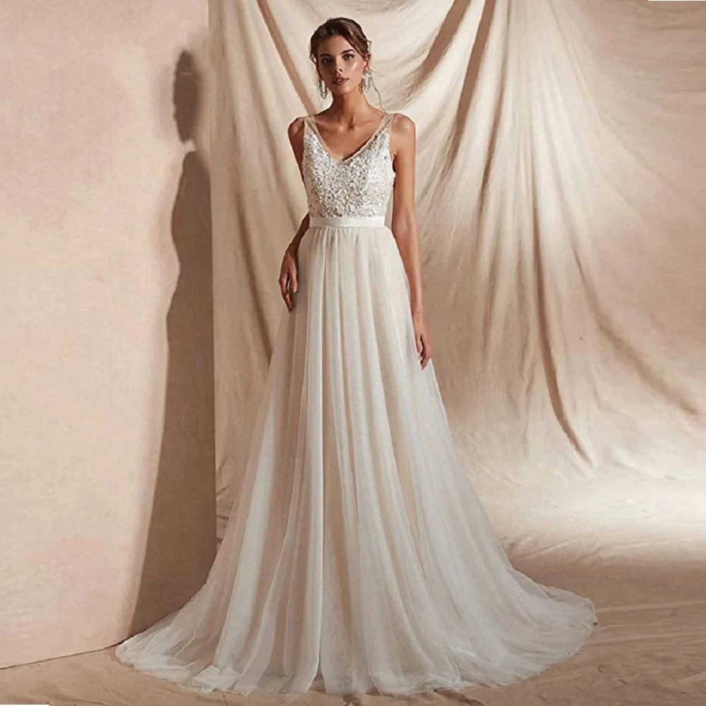 Pretty Wedding Dresses V-Neck A-Line Bridal Gowns Lace Appliques Sleeveless Backless Robes For Formal Party Vestidos De Novia
Pretty Wedding Dresses V-Neck A-Line Bridal Gowns Lace Appliques Sleeveless Backless Robes For Formal Party Vestidos De Novia