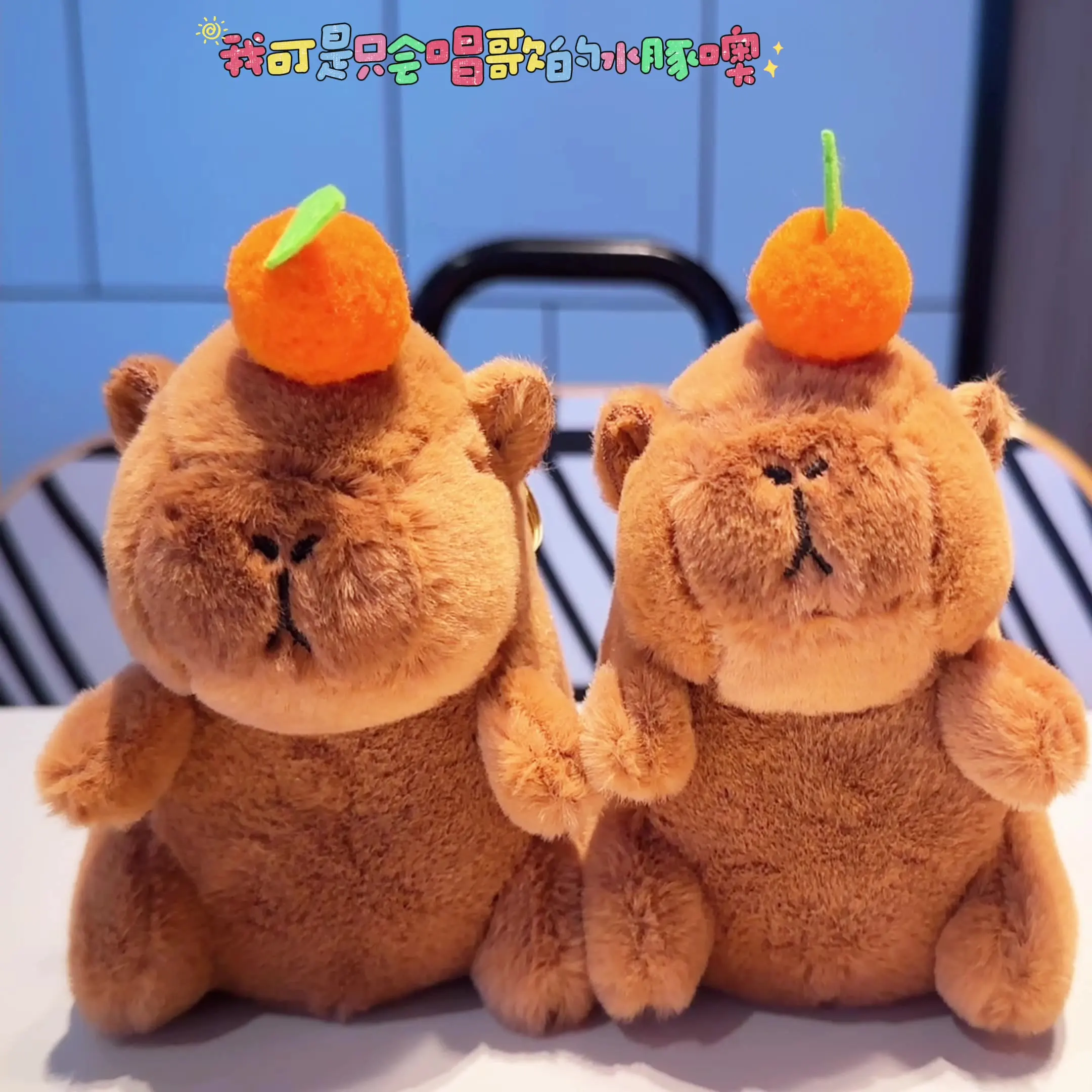 new Creative Persimmon Kapibara plush key chain with music pendant funny car bag key chain fashione doll couple lovely gift
new Creative Persimmon Kapibara plush key chain with music pendant funny car bag key chain fashione doll couple lovely gift