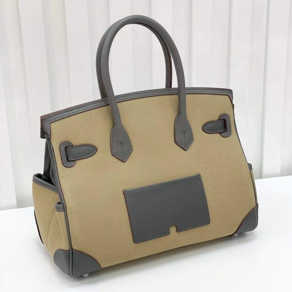 Легкая роскошная женская сумка из высококачественной кожи, сумка-мессенджер из бычьей кожи и канваса, вместительная повседневная универсальная стильная сумка
Легкая роскошная женская сумка из высококачественной кожи, сумка-мессенджер из бычьей кожи и канваса, вместительная повседневная универсальная стильная сумка