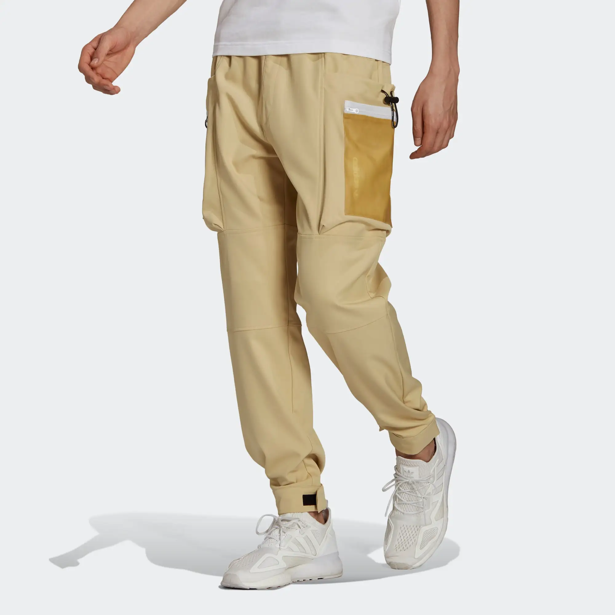 Универсальные брюки-карго Adidas TRACK PANT идеально подходящие для пеших прогулок, путешествий и повседневной носки
Универсальные брюки-карго Adidas TRACK PANT идеально подходящие для пеших прогулок, путешествий и повседневной носки