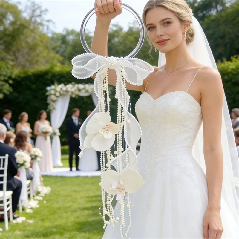 Butterfly Orchid Pearl Tassel Bridal Bouquet With Transparent Ring Wrist Corsage For Bride Morning Registry Wedding Photoshoot
Butterfly Orchid Pearl Tassel Bridal Bouquet With Transparent Ring Wrist Corsage For Bride Morning Registry Wedding Photoshoot