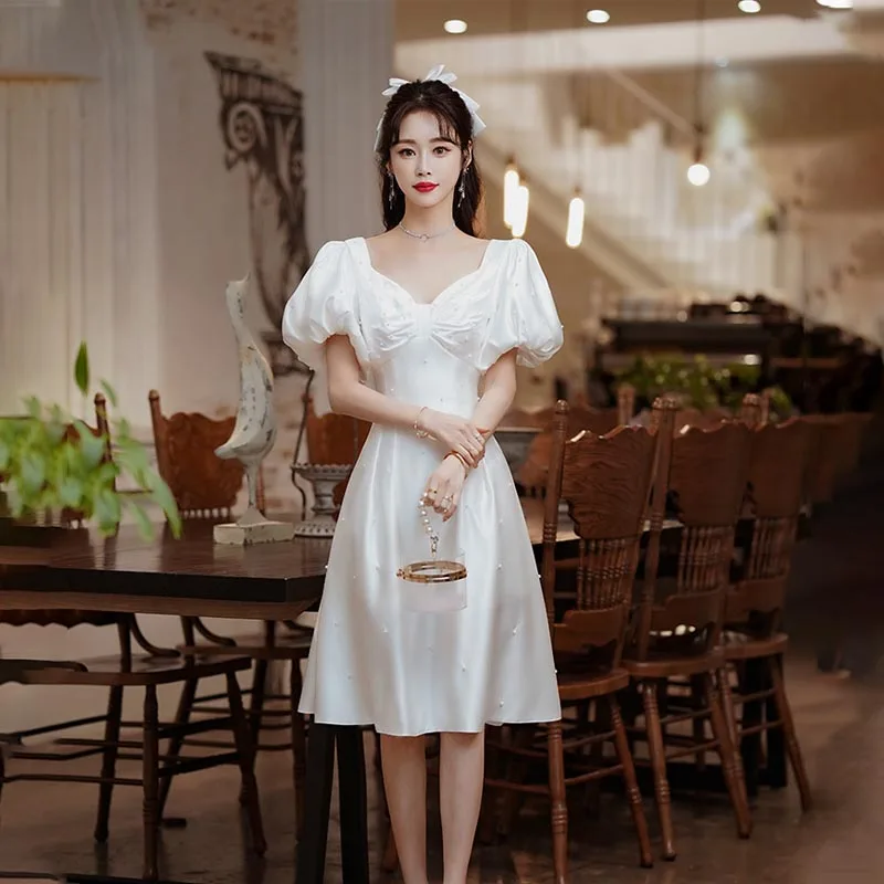Evening Dress V-Neck Empire Short Sleeve Pearls Knee-Length Zipper Back A-Line White Satin Elegant Woman Formal Party Gown A2437
Evening Dress V-Neck Empire Short Sleeve Pearls Knee-Length Zipper Back A-Line White Satin Elegant Woman Formal Party Gown A2437