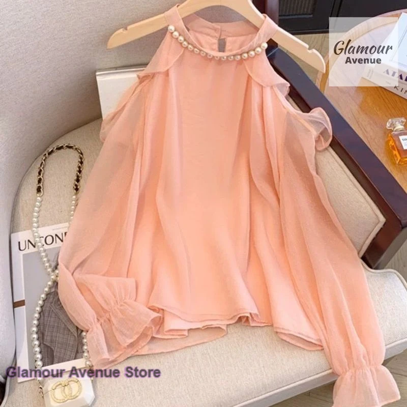Korean gentle chiffon top women's spring and summer new fashion long sleeve hollow off-the-shoulder beaded neck casual shirt
Korean gentle chiffon top women's spring and summer new fashion long sleeve hollow off-the-shoulder beaded neck casual shirt