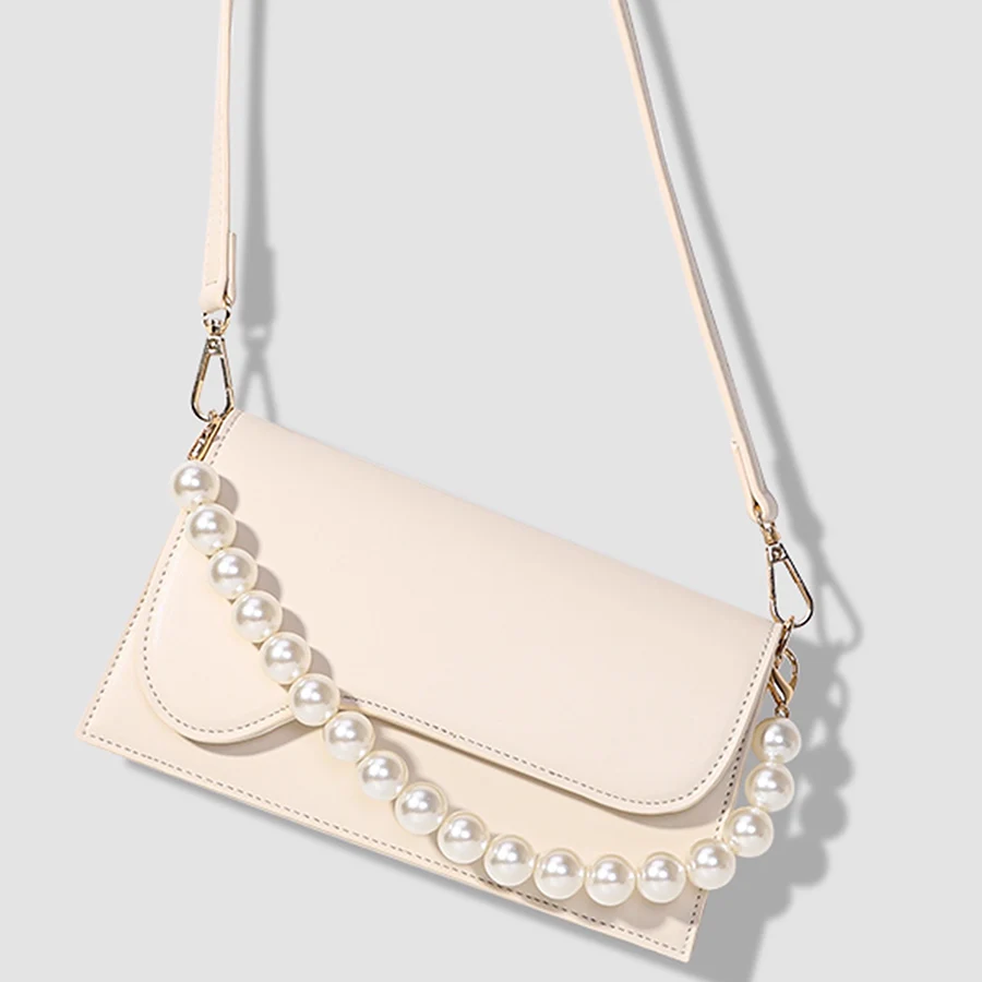 Fashion pearl chains flip single-shoulder crossbody underarm bag for women small square bag pu leather purse handbags versatile
Fashion pearl chains flip single-shoulder crossbody underarm bag for women small square bag pu leather purse handbags versatile