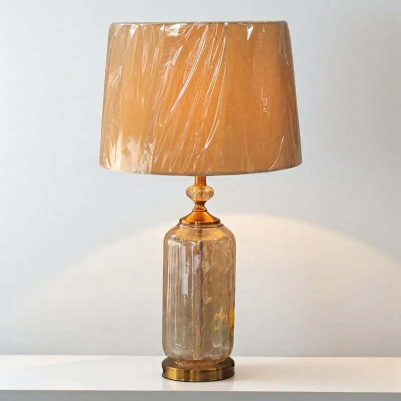 Handcrafted modern minimalist glass table lamp with ambient lighting for bedroom decoration
Handcrafted modern minimalist glass table lamp with ambient lighting for bedroom decoration